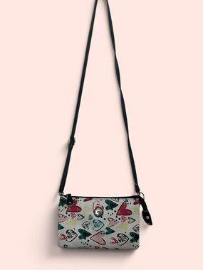 Stone & Co white crossbody bag with multi-colored heart print